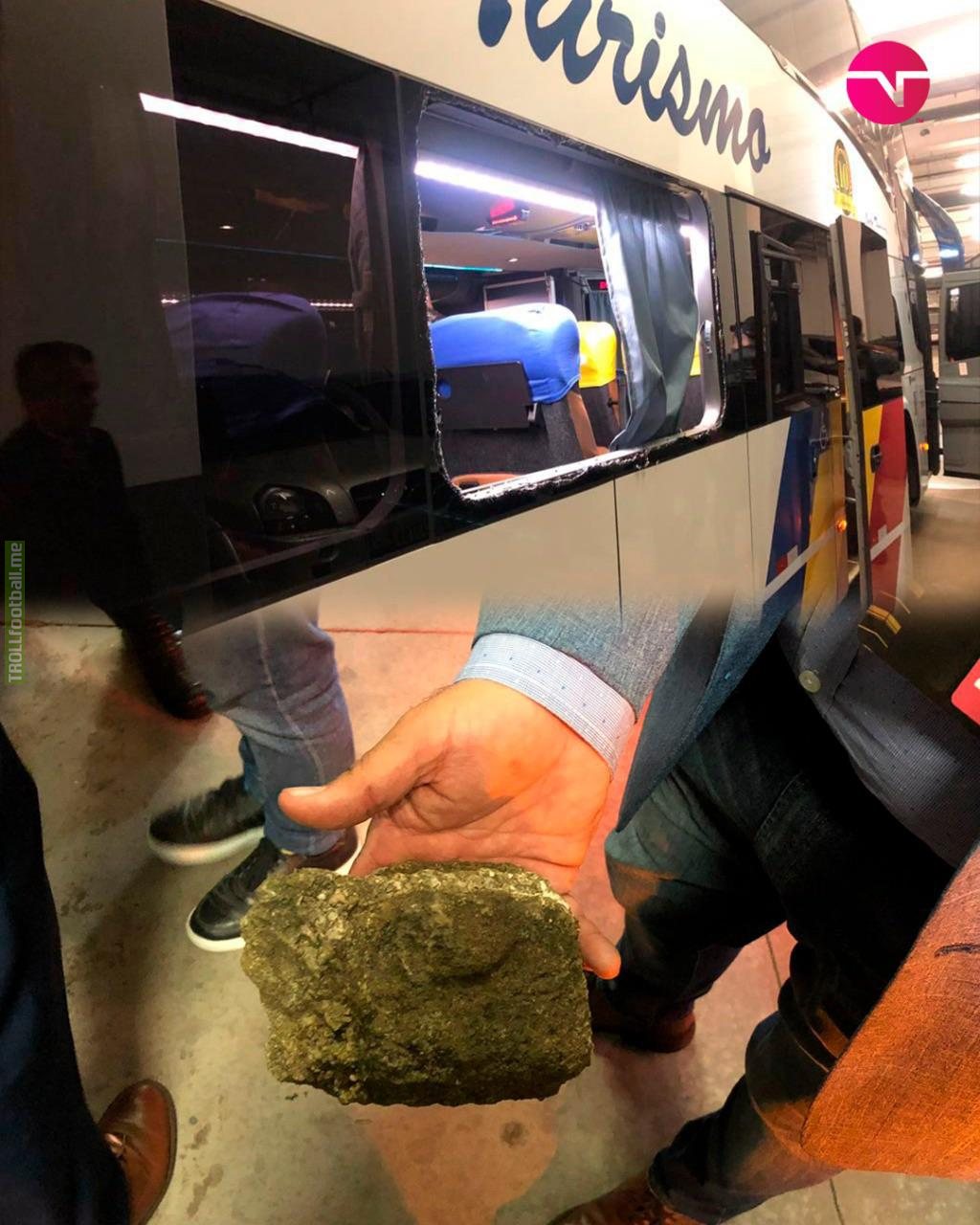 A rock was thrown at Boca Juniors' bus when the bus arrived at Corinthians Arena in São Paulo, shattering a window