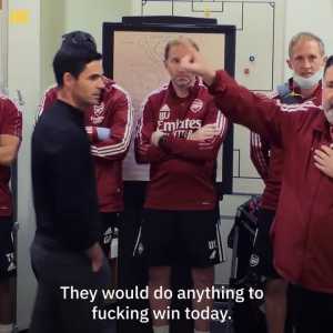 Arsenal club photographer Stuart MacFarlane gives a team talk ahead of Arsenal's 3-1 win over Tottenham