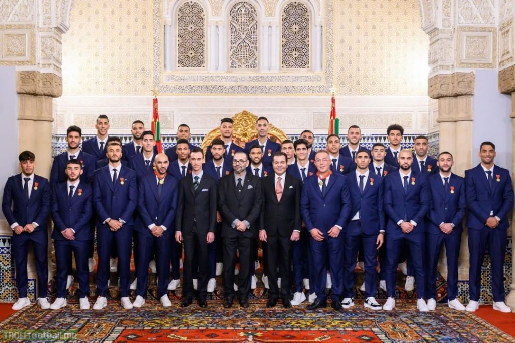 King Mohammed VI (Center) flanked by his brother and son, with the Moroccan National Team following a decoration ceremony at the Royal Palace in Rabat