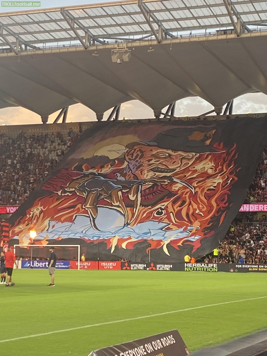 Red and black bloc tifo in the Sydney derby